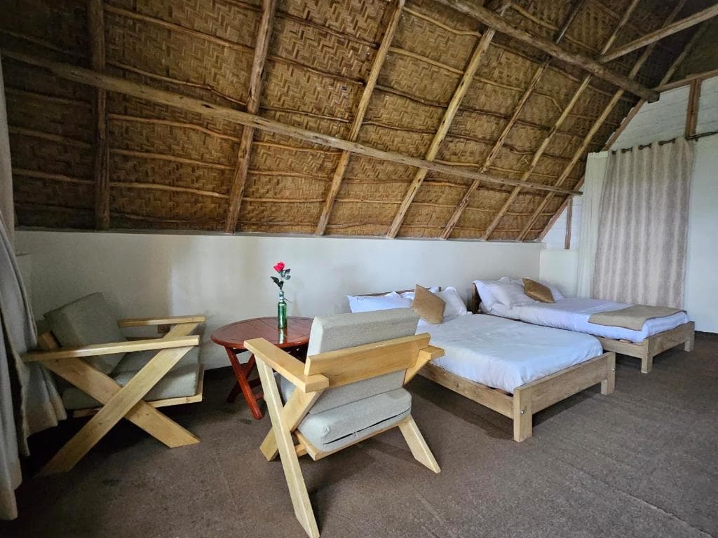 quadraple room at Bugoma Palms Resort Beach & Hotel