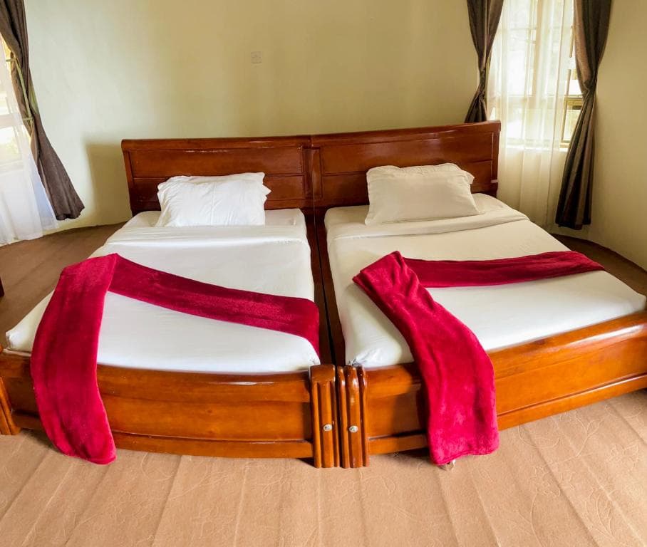 Twin Room Lake view at Bugoma Palms Resort Beach & Hotel